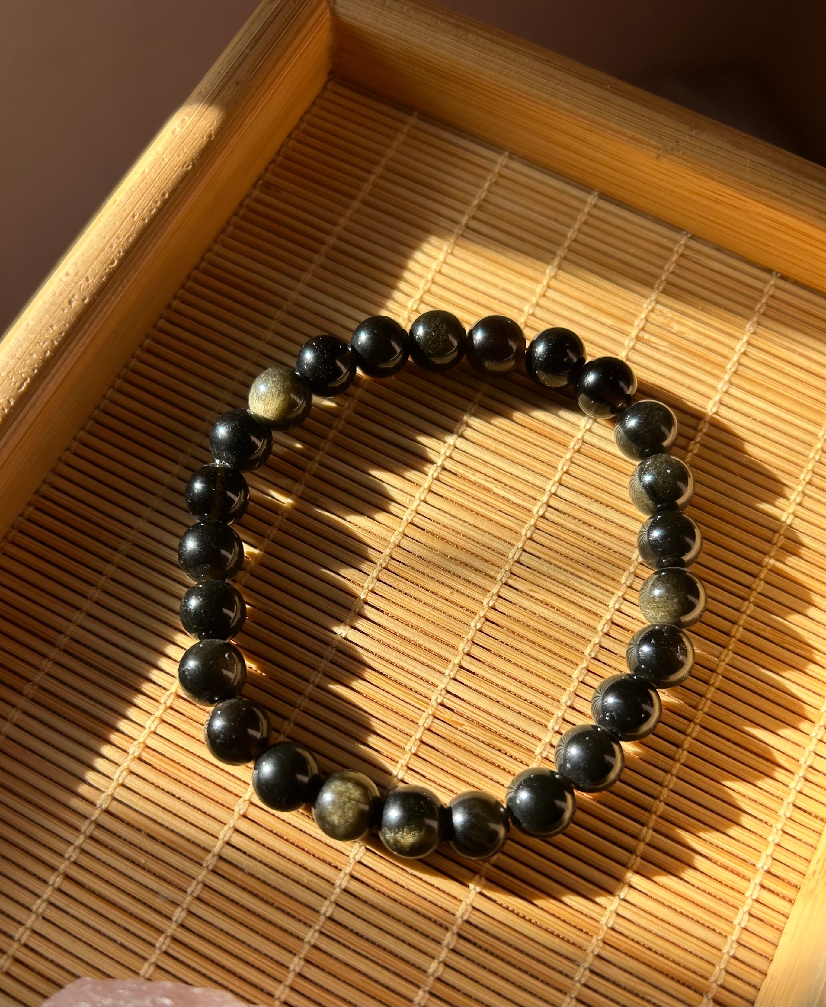 Bracelet obssidienne dorée